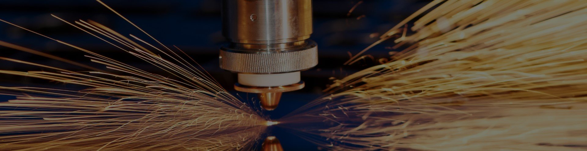 Technician servicing an industrial CNC plasma cutting machine